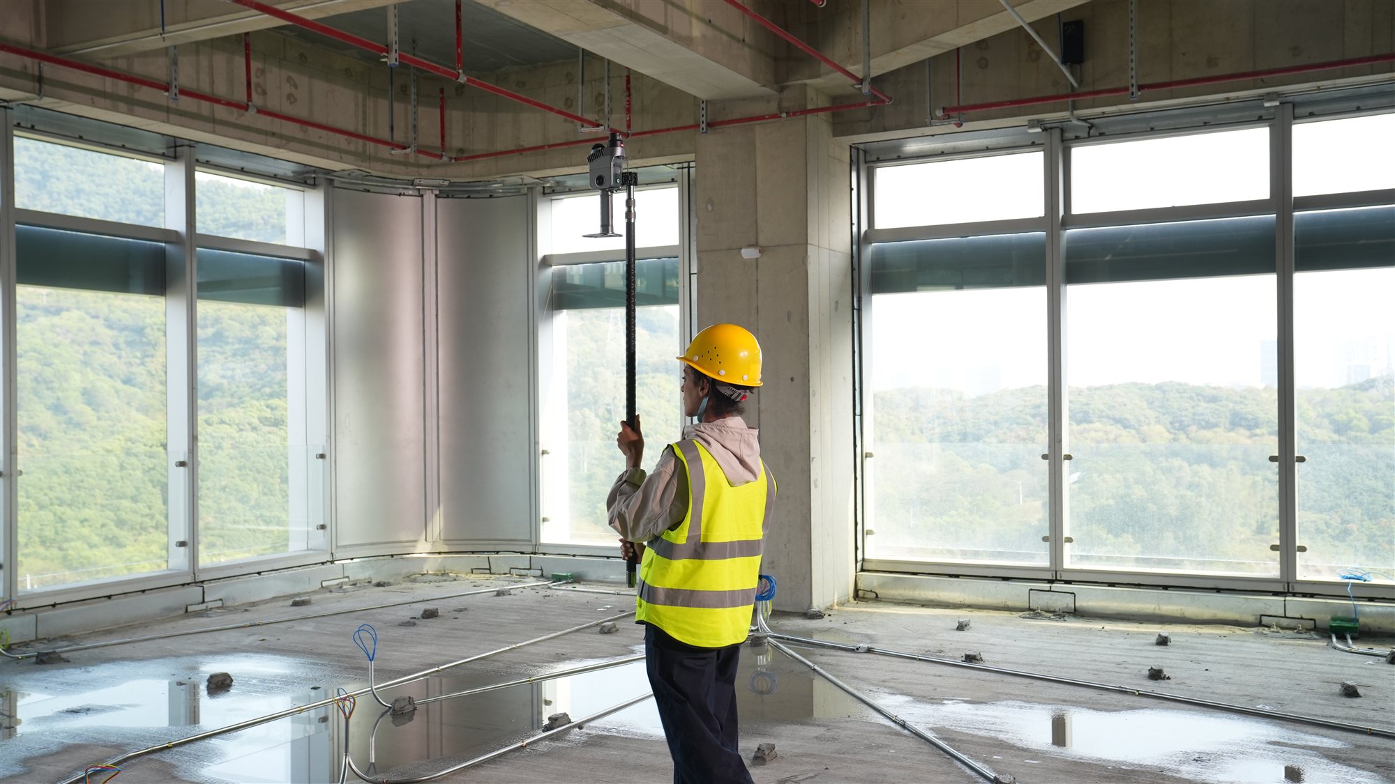 XGRIDS Lixel K2 mobiele SLAM-laserscanner met smartphone en extension pole